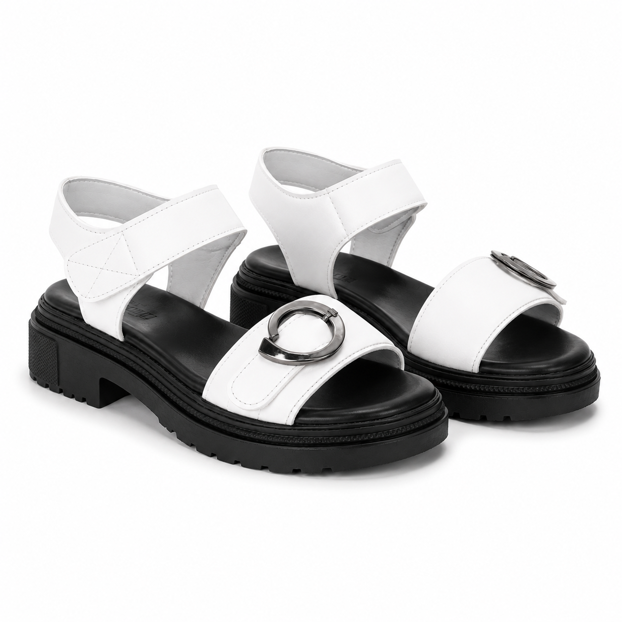 Orbit White platform sandals from ROAMÉ by VAYA featuring premium white synthetic leather straps, silver buckle details, a black cushioned footbed, and a lightweight PU platform sole for everyday comfort.