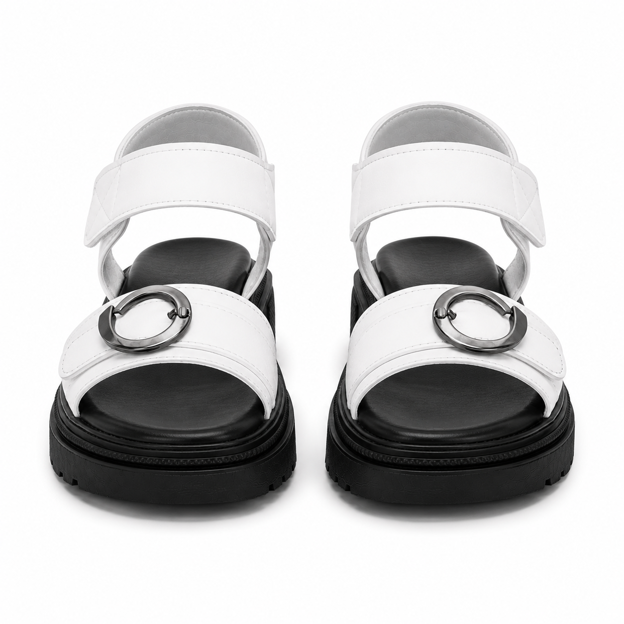 Orbit White platform sandals from ROAMÉ by VAYA featuring premium white synthetic leather straps, silver buckle details, a black cushioned footbed, and a lightweight PU platform sole for everyday comfort.